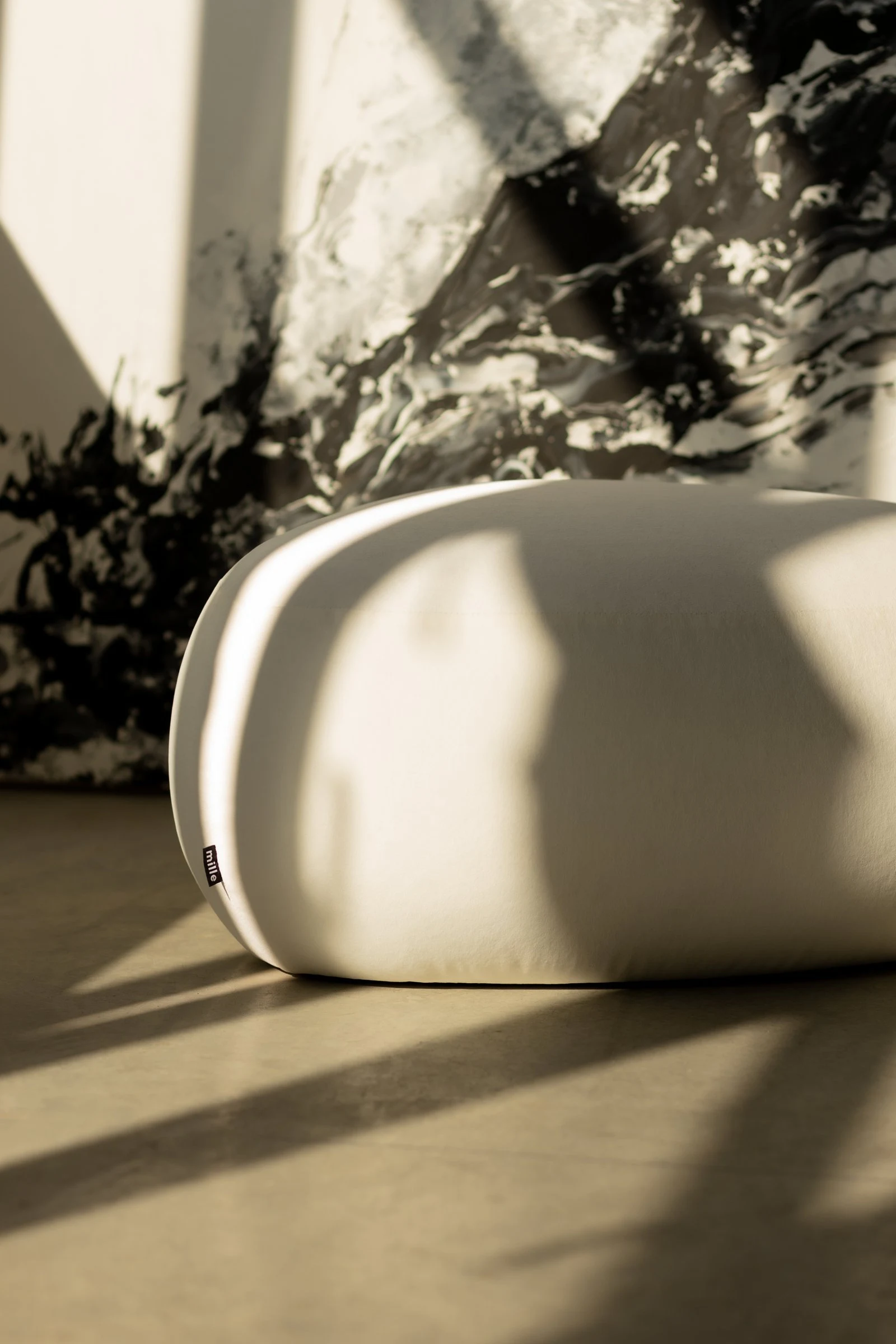 Chios pouf in Glasgow 802 natural textured Belgian weave, studio shot