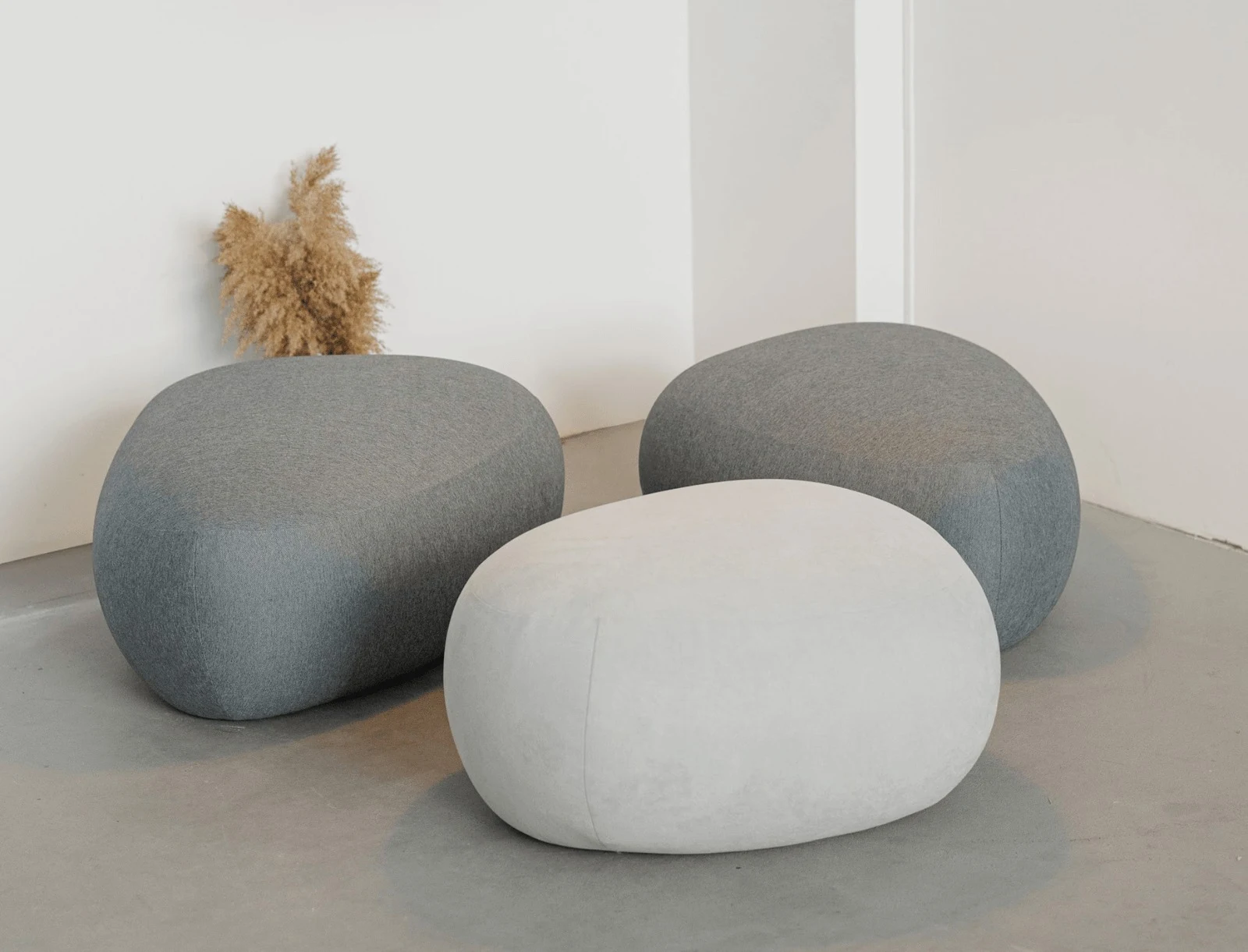Chios pouf in a real apartment setting against a soft pale wall