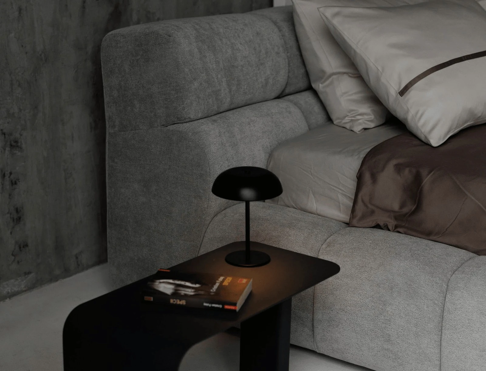 Mid-grey velvet Nao with a small black mushroom lamp on a side table