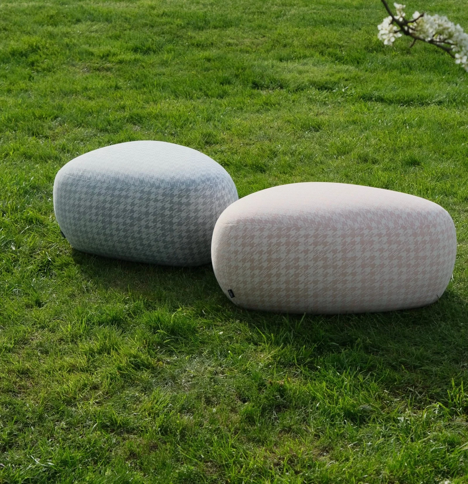 White velvet Chios pouf with dramatic linear shadows
