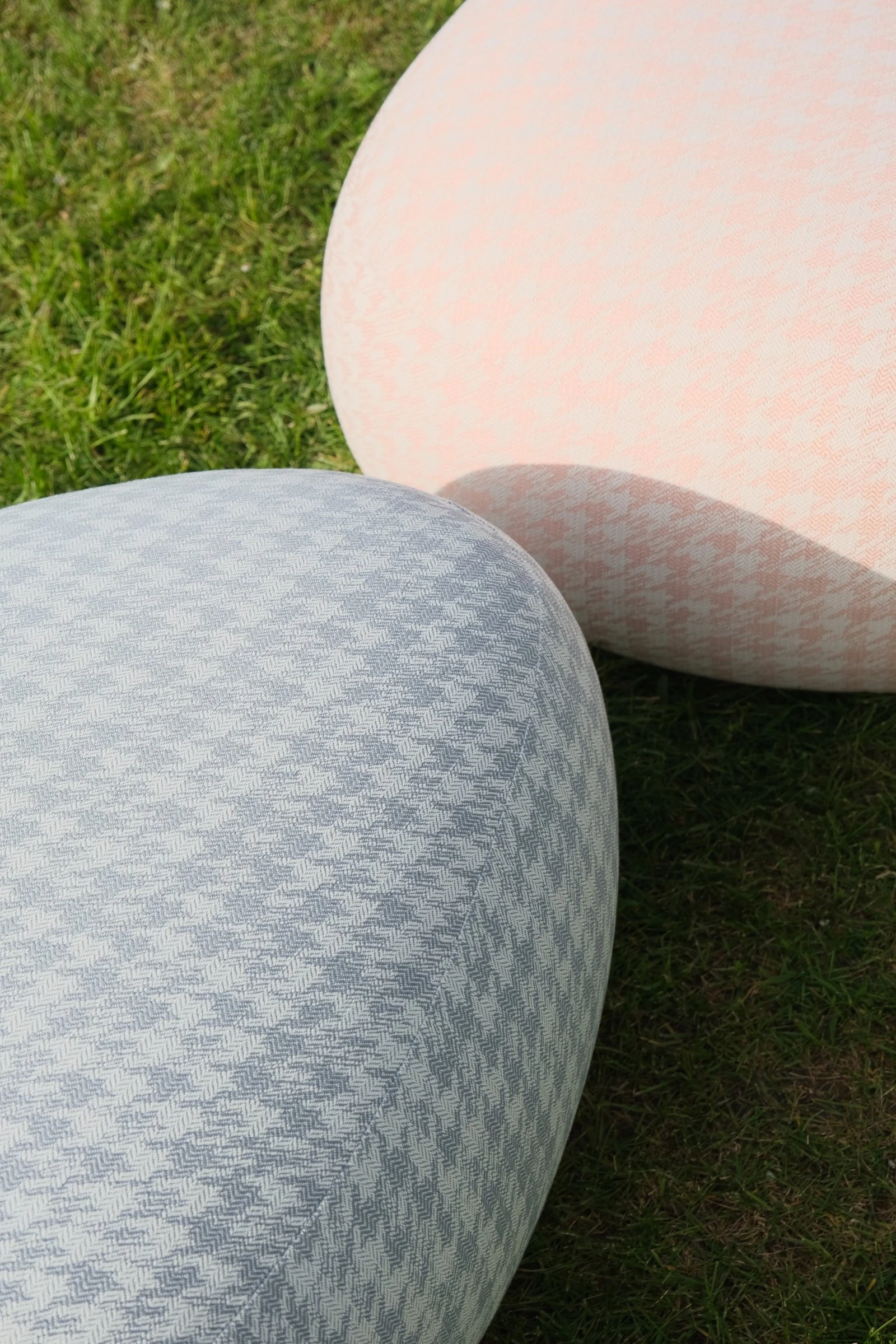 Chios pouf photographed in a real apartment context against a soft wall