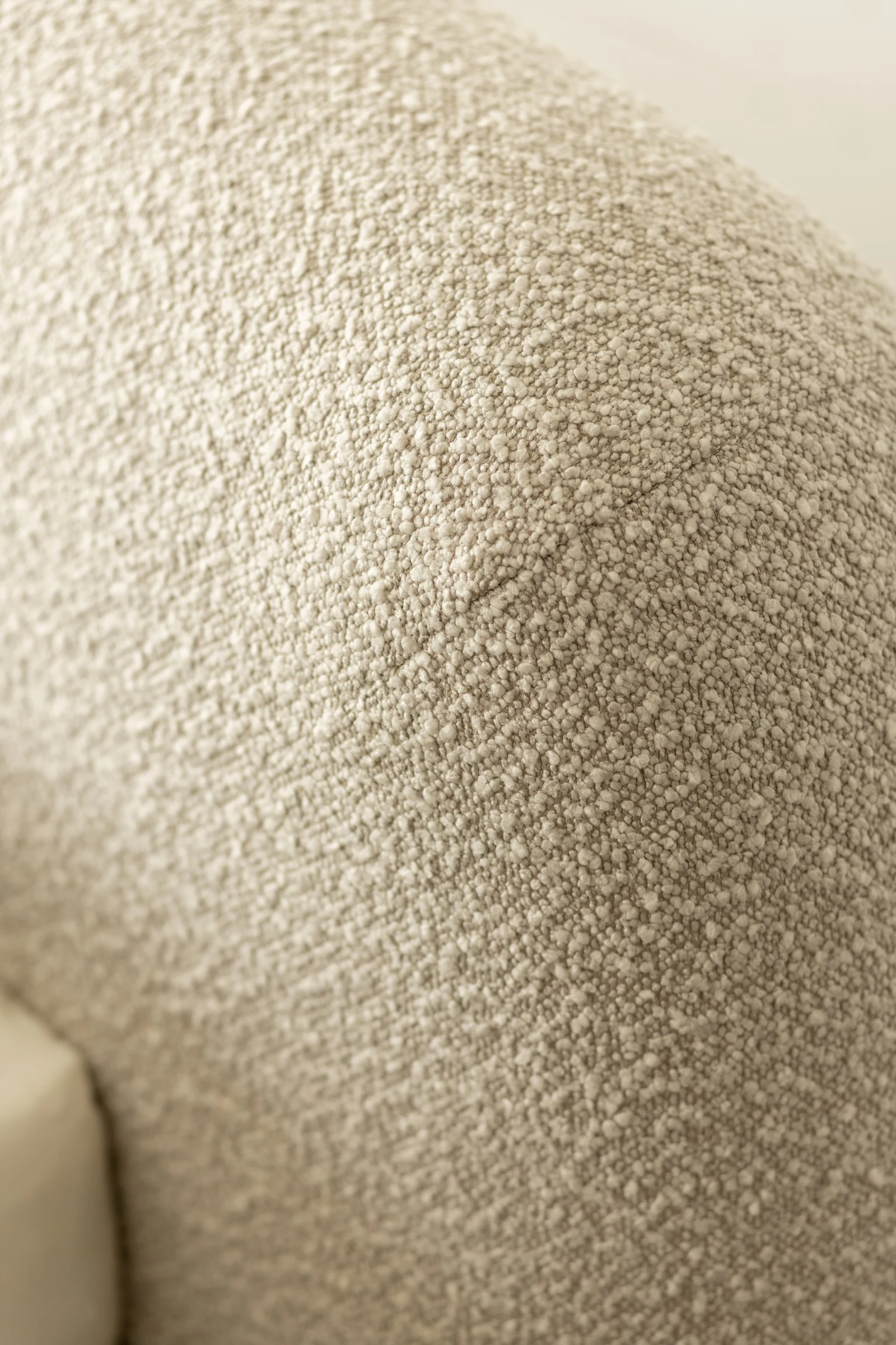 Macro of Copenhagen 900 cream Belgian boucle, the woven loop texture filling the frame