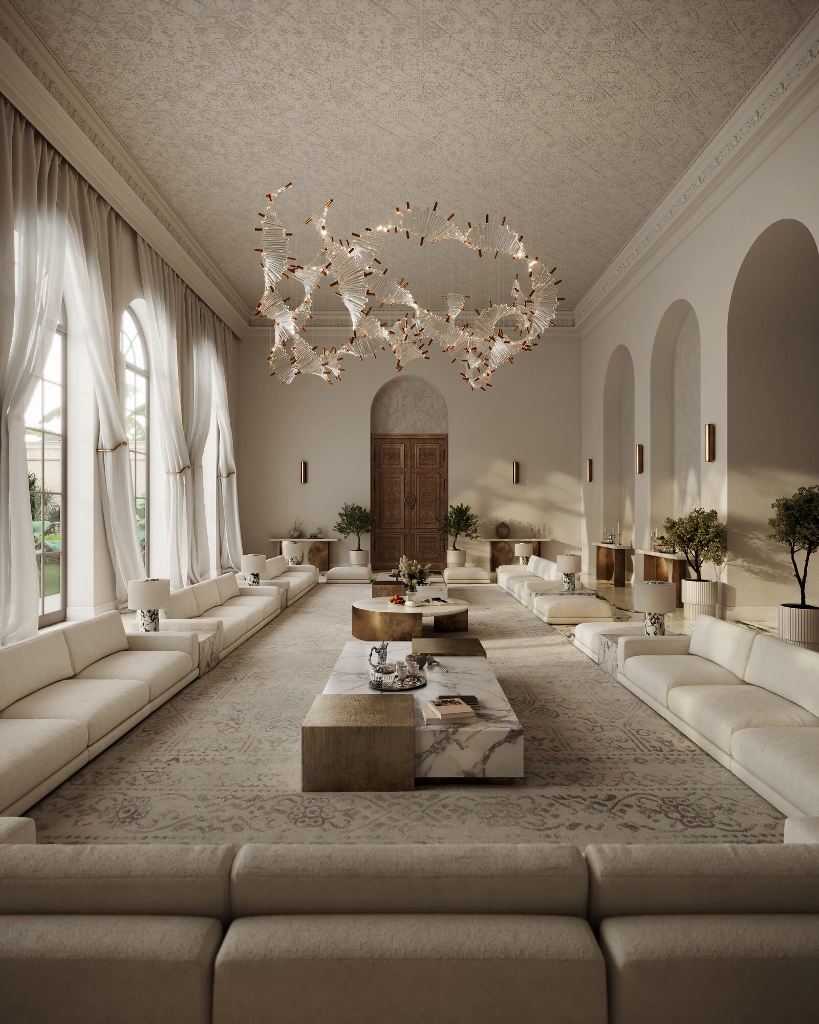 Long majlis with cream Palermos facing across, looking down the central axis toward a wood door and painting