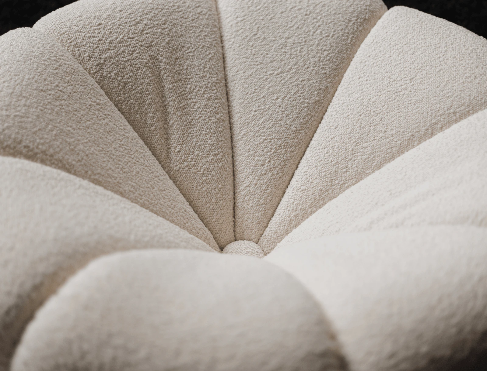 Top-down macro of the Flora back showing the scalloped petals radiating from a central seam