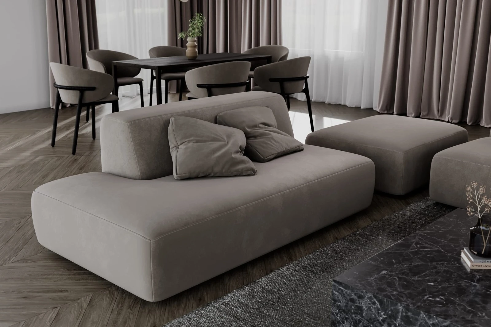 Taupe Kingston close to a black marble coffee table